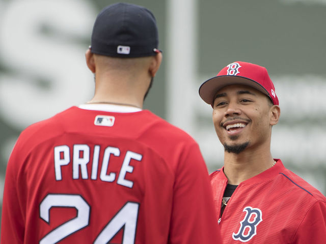 BOSTON, MA - MAY 23: Mookie Betts #50 of the Boston Red Sox talks with David Price #24 before a game against the Texas Rangers on May 23, 2017 at Fenway Park in Boston, Massachusetts.