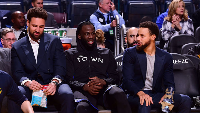SAN FRANCISCO, CA - NOVEMBER 27: Klay Thompson #11, Draymond Green #23, and Stephen Curry #30 of the Golden State Warriors smile during a game against the Chicago Bulls on November 27, 2019 at Chase Center in San Francisco, California. NOTE TO USER: User expressly acknowledges and agrees that, by downloading and or using this photograph, user is consenting to the terms and conditions of Getty Images License Agreement. Mandatory Copyright Notice: Copyright 2019 NBAE