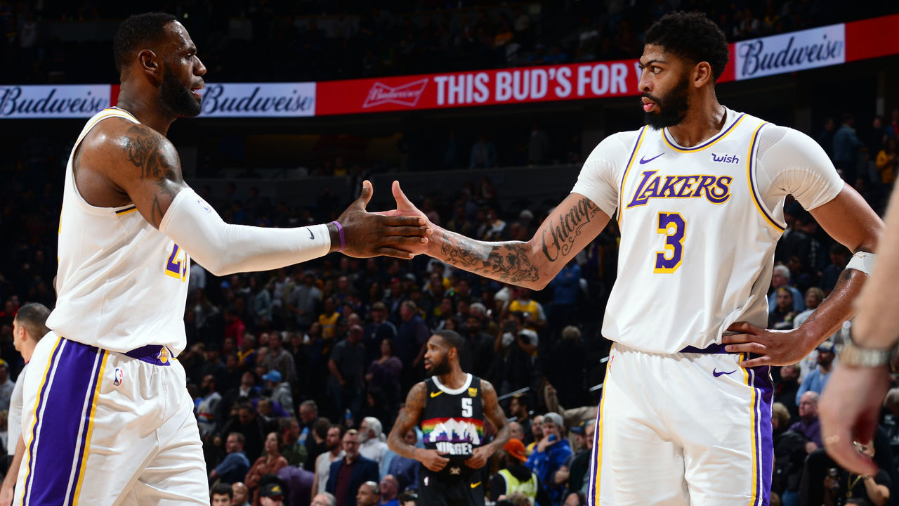 DENVER, CO - DECEMBER 3: LeBron James #23 of the Los Angeles Lakers and Anthony Davis #3 during the game against the Denver Nuggets on December 3, 2019 at the Pepsi Center in Denver, Colorado. NOTE TO USER: User expressly acknowledges and agrees that, by downloading and/or using this Photograph, user is consenting to the terms and conditions of the Getty Images License Agreement. Mandatory Copyright Notice: Copyright 2019 NBAE