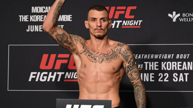 GREENVILLE, SC - JUNE 21: Renato Moicano of Brazil poses on the scale during the UFC Fight Night weigh-in at the Hyatt Regency Greenville on June 21, 2019 in Greenville, South Carolina.