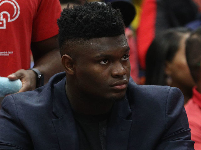 NEW ORLEANS, LOUISIANA - NOVEMBER 27: Zion Williamson #1 of the New Orleans Pelicans sits on the bench during the game against the Los Angeles Lakers at Smoothie King Center on November 27, 2019 in New Orleans, Louisiana. NOTE TO USER: User expressly acknowledges and agrees that, by downloading and/or using this photograph, user is consenting to the terms and conditions of the Getty Images License Agreement