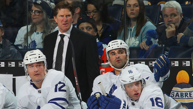 BUFFALO, NY - MARCH 5: Head coach Mike Babcock, Patrick Marleau #12, Nazem Kadri #43 and Mitchell Marner #16 of the Toronto Maple Leafs watch during a 5-3 loss to the Buffalo Sabres in an NHL game on March 5, 2018 at KeyBank Center in Buffalo, New York.