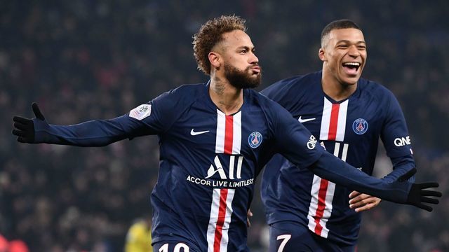 Paris Saint-Germain's Brazilian forward Neymar (L) and Paris Saint-Germain's French forward Kylian Mbappe celebrate after scoring their team's first goal during the French L1 football match between Paris Saint-Germain (PSG) and FC Nantes (FCN) at the Parc des Princes in Paris, on December 4, 2019.
