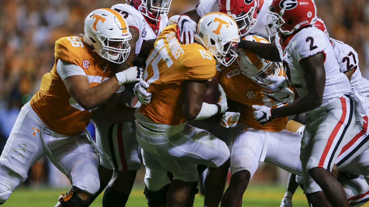 KNOXVILLE, TENNESSEE - OCTOBER 05: Juan Jennings #15 of the Tennessee Volunteers is stopped by the Georgia Bulldogs after running with the ball during the second quarter at Neyland Stadium on October 05, 2019 in Knoxville, Tennessee.