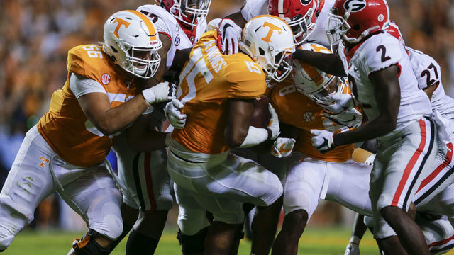 KNOXVILLE, TENNESSEE - OCTOBER 05: Juan Jennings #15 of the Tennessee Volunteers is stopped by the Georgia Bulldogs after running with the ball during the second quarter at Neyland Stadium on October 05, 2019 in Knoxville, Tennessee.