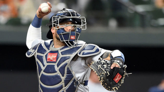 BALTIMORE, MD - SEPTEMBER 20: Omar Narvaez #22 of the Seattle Mariners throws to second base during a baseball game against the Baltimore Orioles at Oriole Park at Camden Yards on September 20, 2019 in Baltimore, Maryland.
