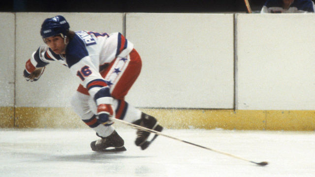 NEW YORK, NY - FEBRUARY 9: Sergei Makarov #24 of the USSR and Mark Pavelich #16 of Team USA go for the puck during an 1980 exhibition game on February 9, 1980 at the Madison Square Garden in New York, New York.
