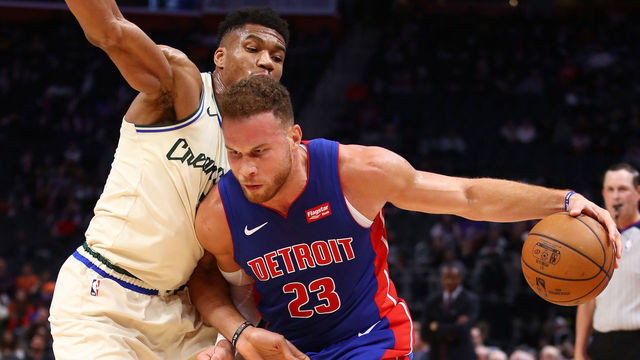 DETROIT, MICHIGAN - DECEMBER 04: Blake Griffin #23 of the Detroit Pistons tries to drive around Giannis Antetokounmpo #34 of the Milwaukee Bucks during the first half at Little Caesars Arena on December 04, 2019 in Detroit, Michigan.