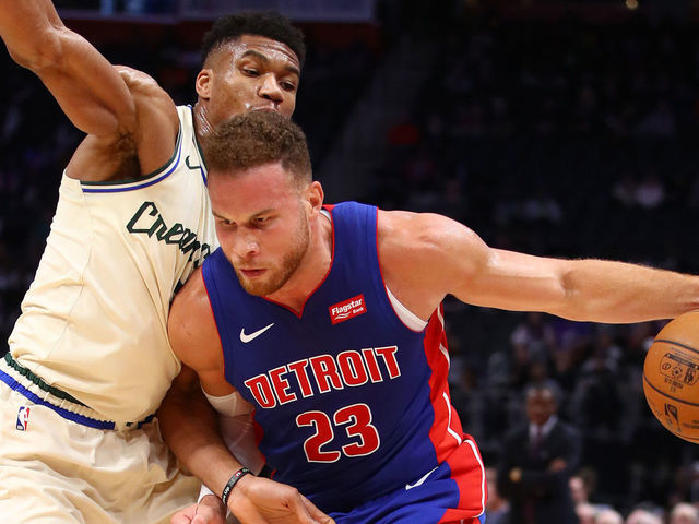 DETROIT, MICHIGAN - DECEMBER 04: Blake Griffin #23 of the Detroit Pistons tries to drive around Giannis Antetokounmpo #34 of the Milwaukee Bucks during the first half at Little Caesars Arena on December 04, 2019 in Detroit, Michigan.