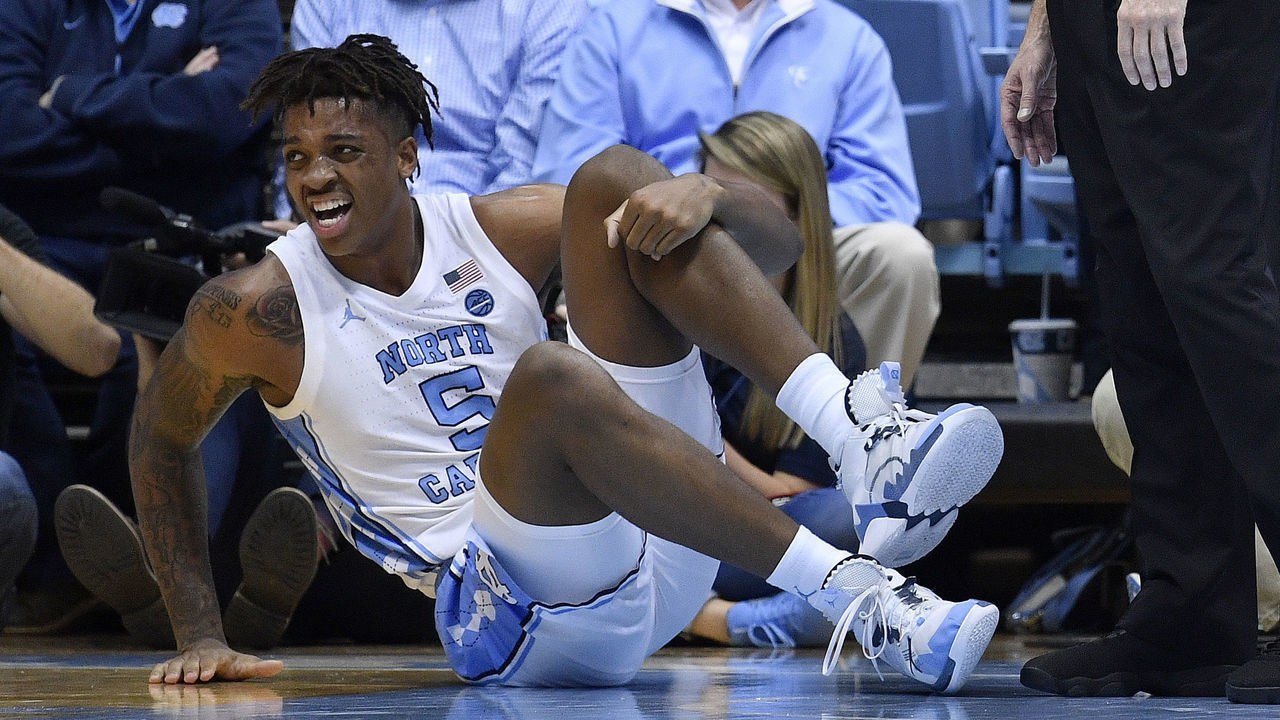CHAPEL HILL, NORTH CAROLINA - DECEMBER 04: Armando Bacot #5 of the North Carolina Tar Heels reacts after being injured during the first half of their game against the Ohio State Buckeyesat the Dean Smith Center on December 04, 2019 in Chapel Hill, North Carolina.