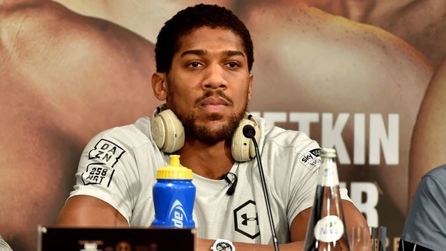 British heavyweight boxing challenger Anthony Joshua is pictured during a press conference in Diriyah in the Saudi capital Riyadh, on December 4, 2019, ahead of the upcoming "Clash on the Dunes". - The hotly-anticipated rematch between Ruiz Jr and British challenger Anthony Joshua is scheduled to take place in Diriya, near the Saudi capital on December 7.