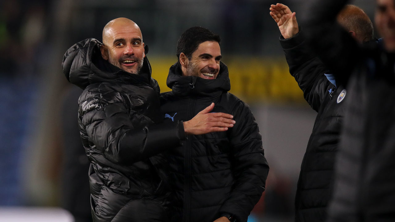BURNLEY, ENGLAND - DECEMBER 03: Pep Guardiola the head coach / manager of Manchester City celebrates with Mikel Arteta the assistant head coach / manager of Manchester City during the Premier League match between Burnley FC and Manchester City at Turf Moor on December 3, 2019 in Burnley, United Kingdom.