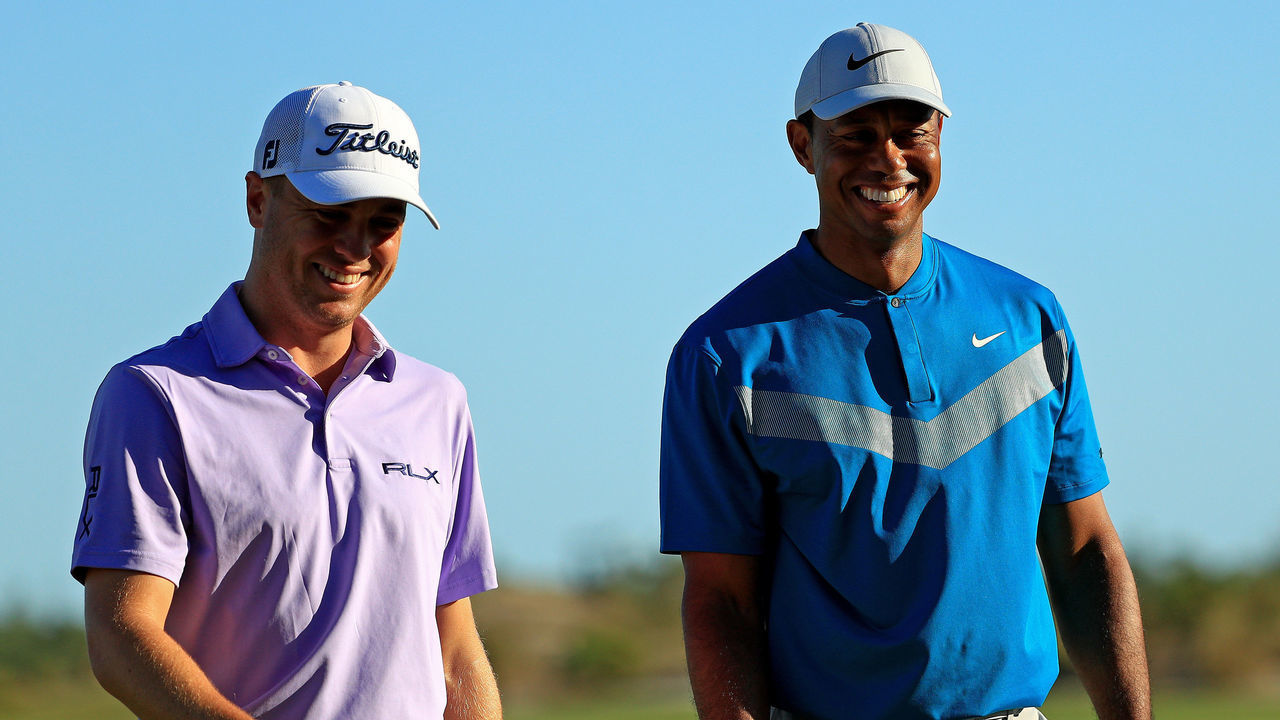 NASSAU, BAHAMAS - DECEMBER 06: Tiger Woods and Justin Thomas of the United States walk off the 18th hole during the third round of the Hero World Challenge on December 06, 2019 in Nassau, Bahamas.