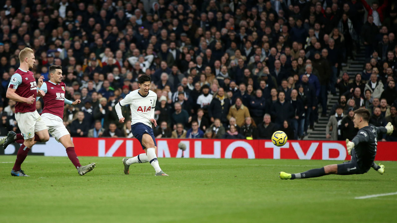 LONDON, ENGLAND - DECEMBER 07: Heung-Min Son of Tottenham Hotspur scores his team's third goal during the Premier League match between Tottenham Hotspur and Burnley FC at Tottenham Hotspur Stadium on December 07, 2019 in London, United Kingdom.