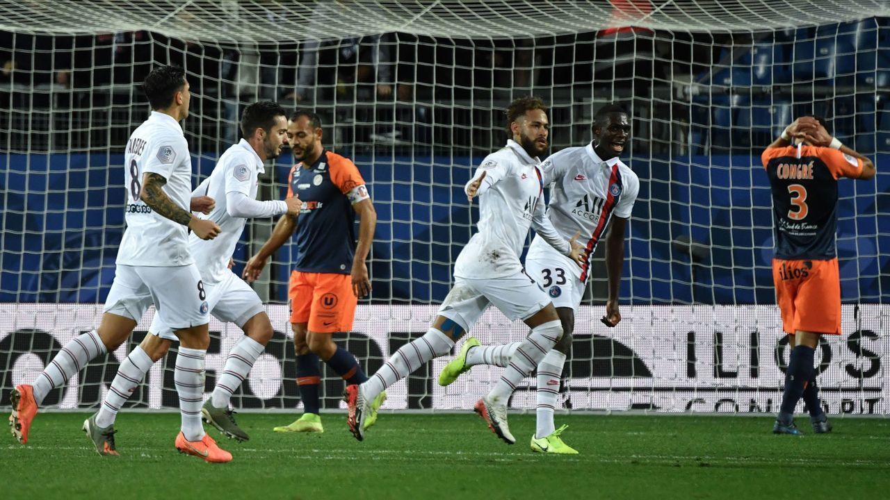Paris Saint-Germain's Brazilian forward Neymar (C) celebrates after scoring a goal during the French L1 football match between Montpellier Herault Sport Club (MHSC) and Paris Saint-Germain (PSG) on December 7, 2019, at the Mosson stadium in Montpellier, southeastern France.