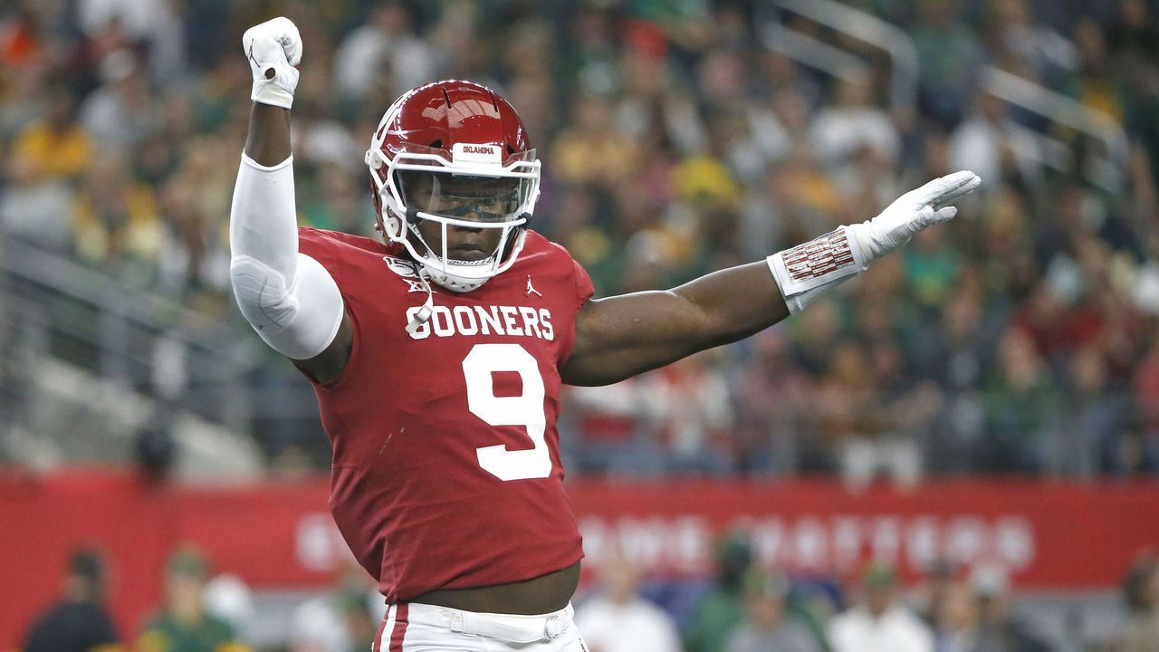 ARLINGTON, TX - DECEMBER 07: Kenneth Murray #9 of the Oklahoma Sooners celebrates after stopping the Baylor Bears offense in the first quarter of the Big 12 Football Championship at AT&T Stadium on December 7, 2019 in Arlington, Texas.
