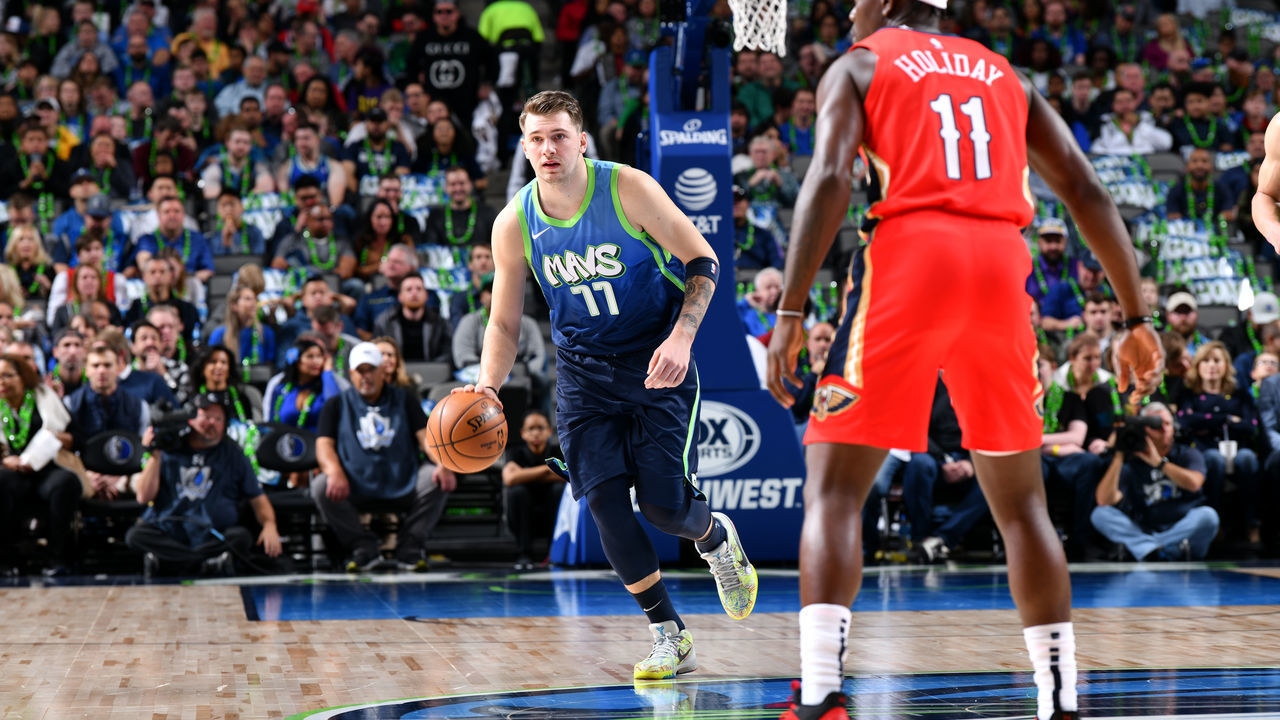 DALLAS, TX - DECEMBER 7: Luka Doncic #77 of the Dallas Mavericks handles the ball against the New Orleans Pelicans on December 07, 2019 at the American Airlines Center in Dallas, Texas. Mandatory Copyright Notice: Copyright 2019 NBAE