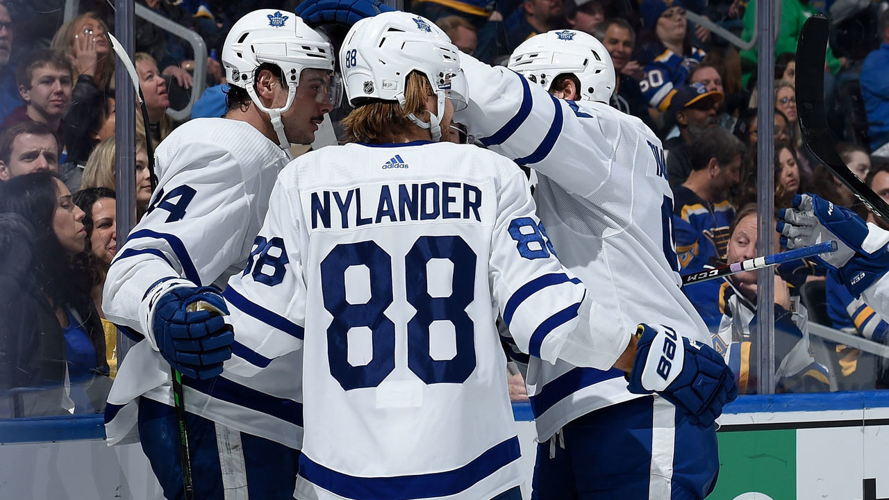 ST. LOUIS, MO - DECEMBER 7: Auston Matthews #34 of the Toronto Maple Leafs is congratulated by teammates after scoring a goal against the St. Louis Blues at Enterprise Center on December 7, 2019 in St. Louis, Missouri.
