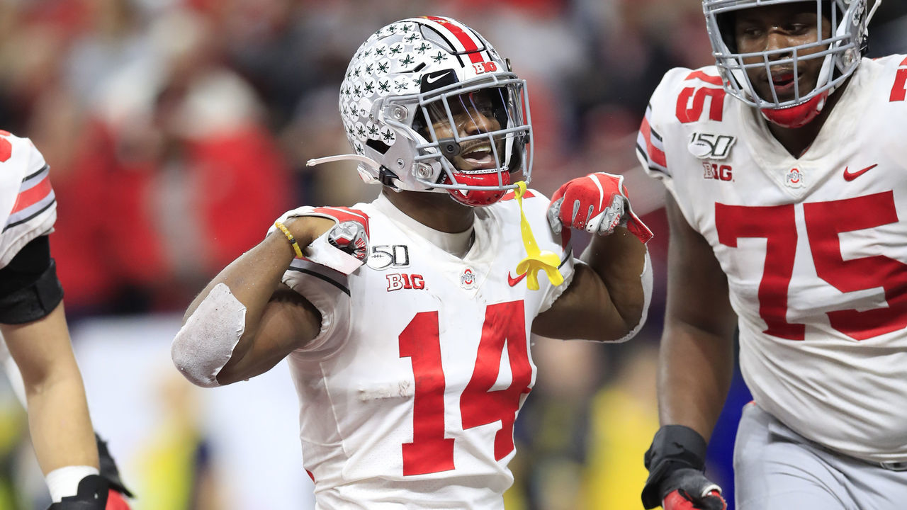 INDIANAPOLIS, INDIANA - DECEMBER 07: K.J. Hill Jr. #14 of the Ohio State Buckeyes celebrates after catching a touchdown pass during the BIG Ten Football Championship Game against the Wisconsin Badgers at Lucas Oil Stadium on December 07, 2019 in Indianapolis, Indiana.