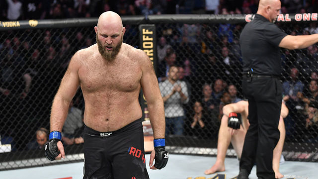 WASHINGTON, DC - DECEMBER 07: (L-R) Ben Rothwell celebrates his TKO victory over Stefan Struve of Netherlands in their heavyweight bout during the UFC Fight Night event at Capital One Arena on December 07, 2019 in Washington, DC.