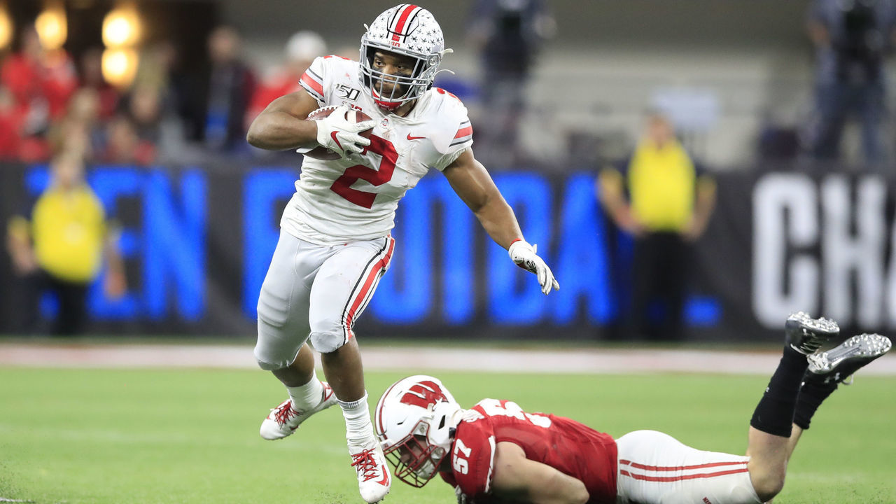 INDIANAPOLIS, INDIANA - DECEMBER 07: J.K. Dobbins #2 of the Ohio State Buckeyes runs with the ball in the BIG Ten Football Championship Game against the Wisconsin Badgers at Lucas Oil Stadium on December 07, 2019 in Indianapolis, Indiana.