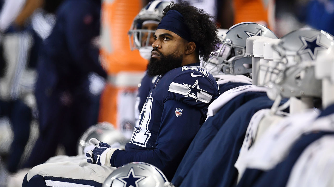 CHICAGO, ILLINOIS - DECEMBER 05: Ezekiel Elliott #21 of the Dallas Cowboys watches action during a game against the Chicago Bears at Soldier Field on December 05, 2019 in Chicago, Illinois. The Bears defeated the Cowboys 31-24.