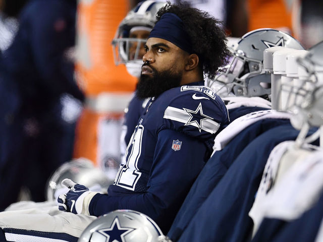 CHICAGO, ILLINOIS - DECEMBER 05: Ezekiel Elliott #21 of the Dallas Cowboys watches action during a game against the Chicago Bears at Soldier Field on December 05, 2019 in Chicago, Illinois. The Bears defeated the Cowboys 31-24.