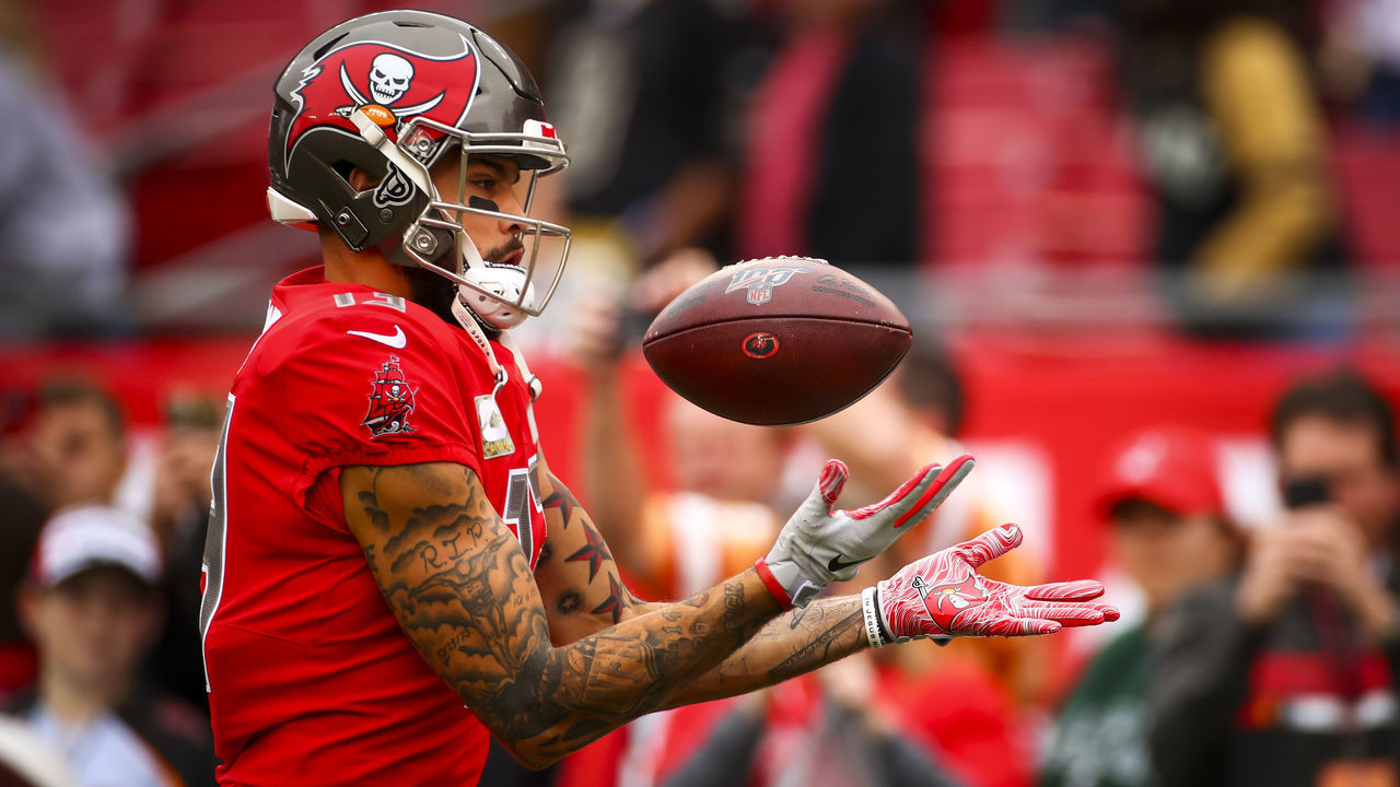 TAMPA, FLORIDA - NOVEMBER 17: Mike Evans #13 of the Tampa Bay Buccaneers warms up before the game against the New Orleans Saints on November 17, 2019 at Raymond James Stadium in Tampa, Florida.