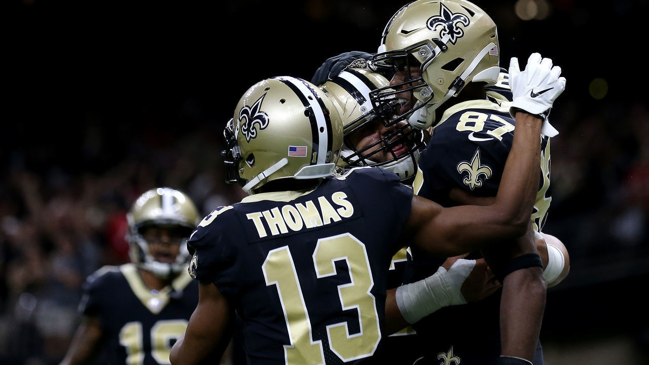 NEW ORLEANS, LOUISIANA - DECEMBER 08: Jared Cook #87 of the New Orleans Saints celebrates with his teammates Michael Thomas #13 and Erik McCoy #78 as he scores a 38 yard touchdown against the San Francisco 49ers during the first quarter in the game at Mercedes Benz Superdome on December 08, 2019 in New Orleans, Louisiana.
