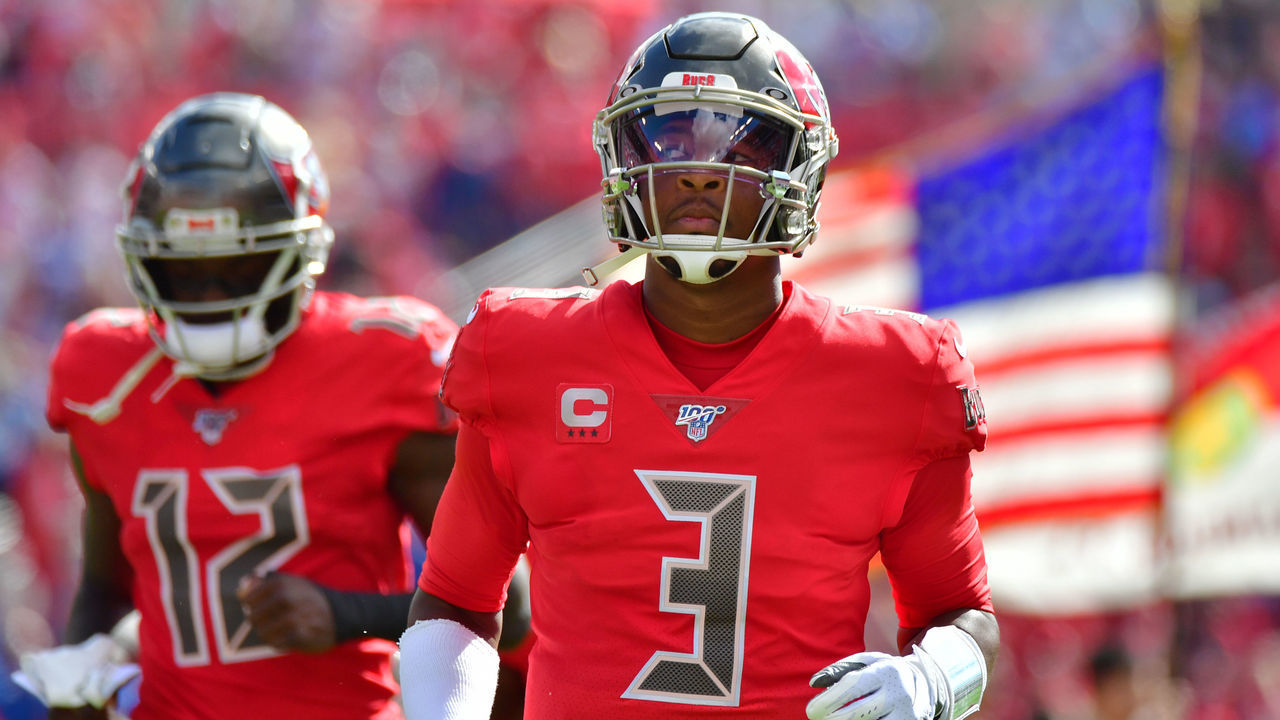TAMPA, FLORIDA - DECEMBER 08: Jameis Winston #3 (right) and Chris Godwin #12 of the Tampa Bay Buccaneers runs out to the field prior to a football game against the Indianapolis Colts at Raymond James Stadium on December 08, 2019 in Tampa, Florida.
