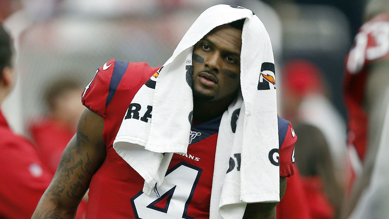 HOUSTON, TEXAS - DECEMBER 08: Deshaun Watson #4 of the Houston Texans stands in the bench area during the third quarter against the Denver Broncos at NRG Stadium on December 08, 2019 in Houston, Texas.