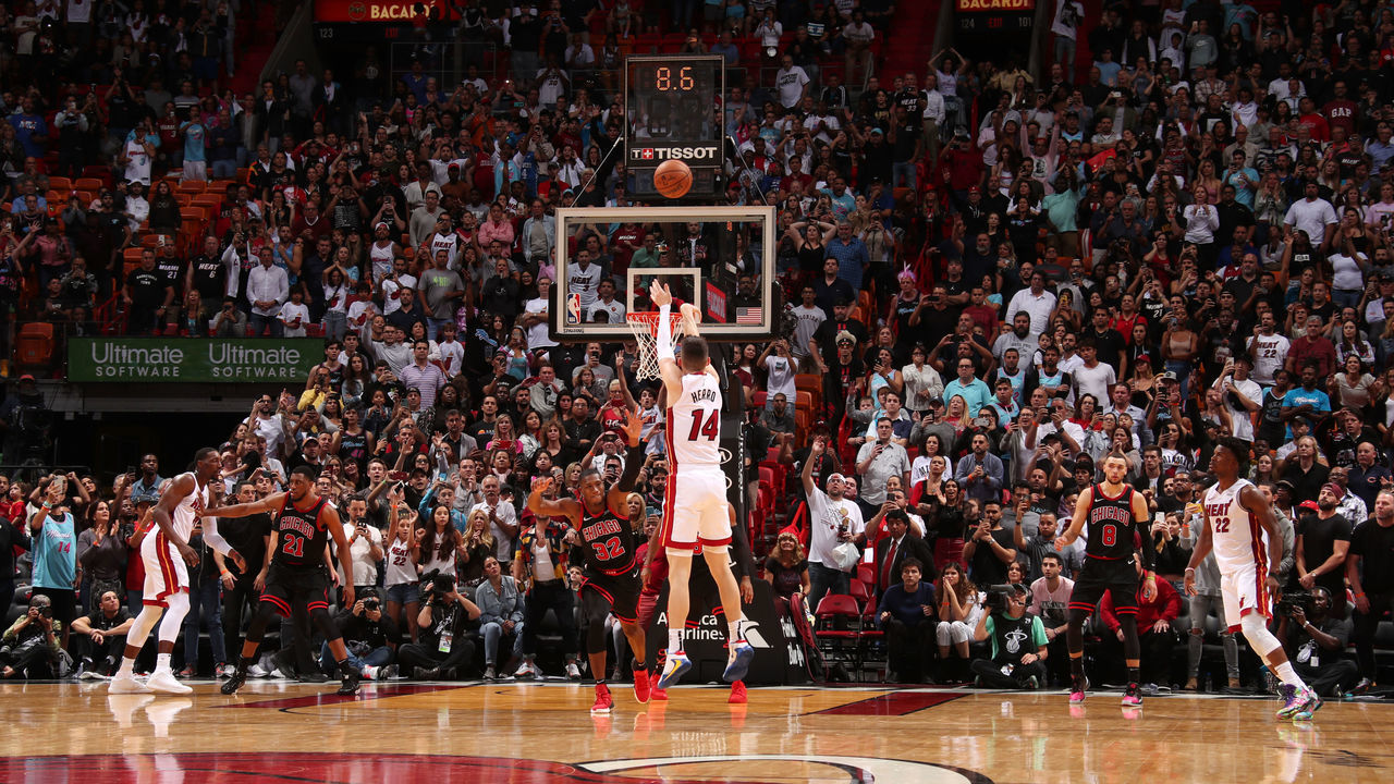 MIAMI, FL - DECEMBER 8: Tyler Herro #14 of the Miami Heat hits a three point basket to tie the game against the Chicago Bulls on December 8, 2019 at American Airlines Arena in Miami, Florida. Mandatory Copyright Notice: Copyright 2019 NBAE