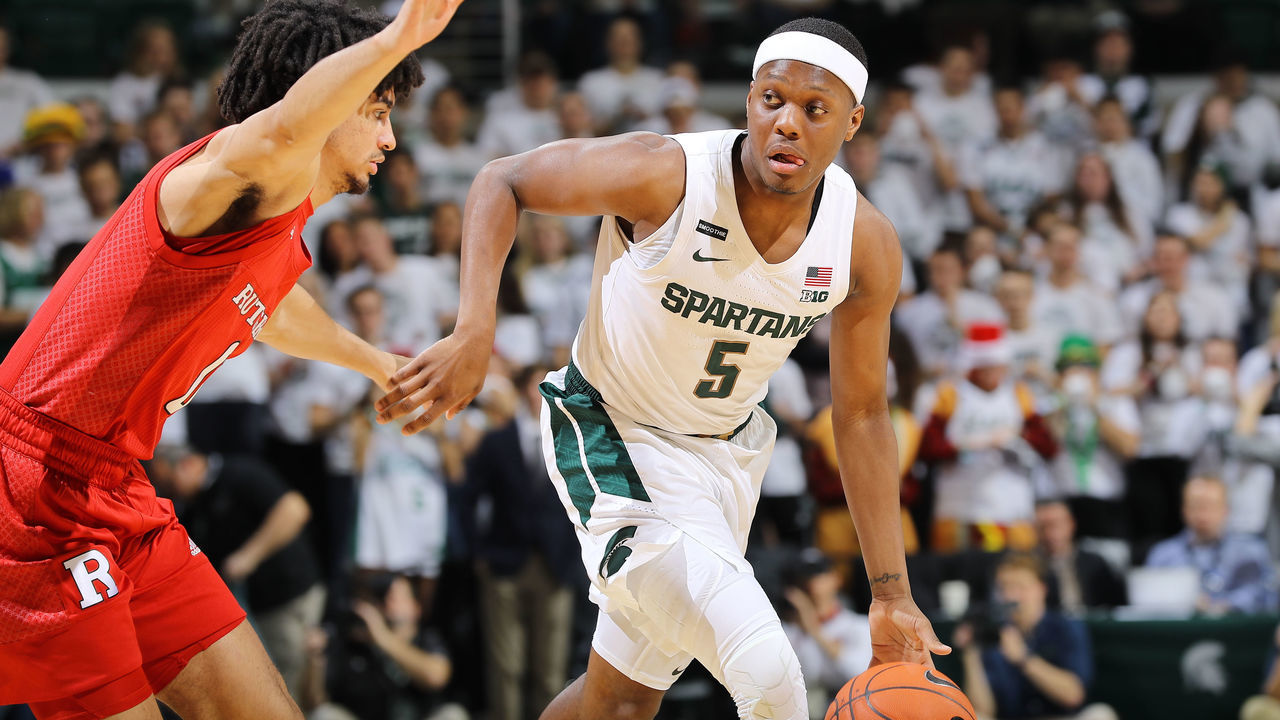 EAST LANSING, MI - DECEMBER 08: Cassius Winston #5 of the Michigan State Spartans drivers to the basket in the first half against the Rutgers Scarlet Knights at the Breslin Center on December 8, 2019 in East Lansing, Michigan.