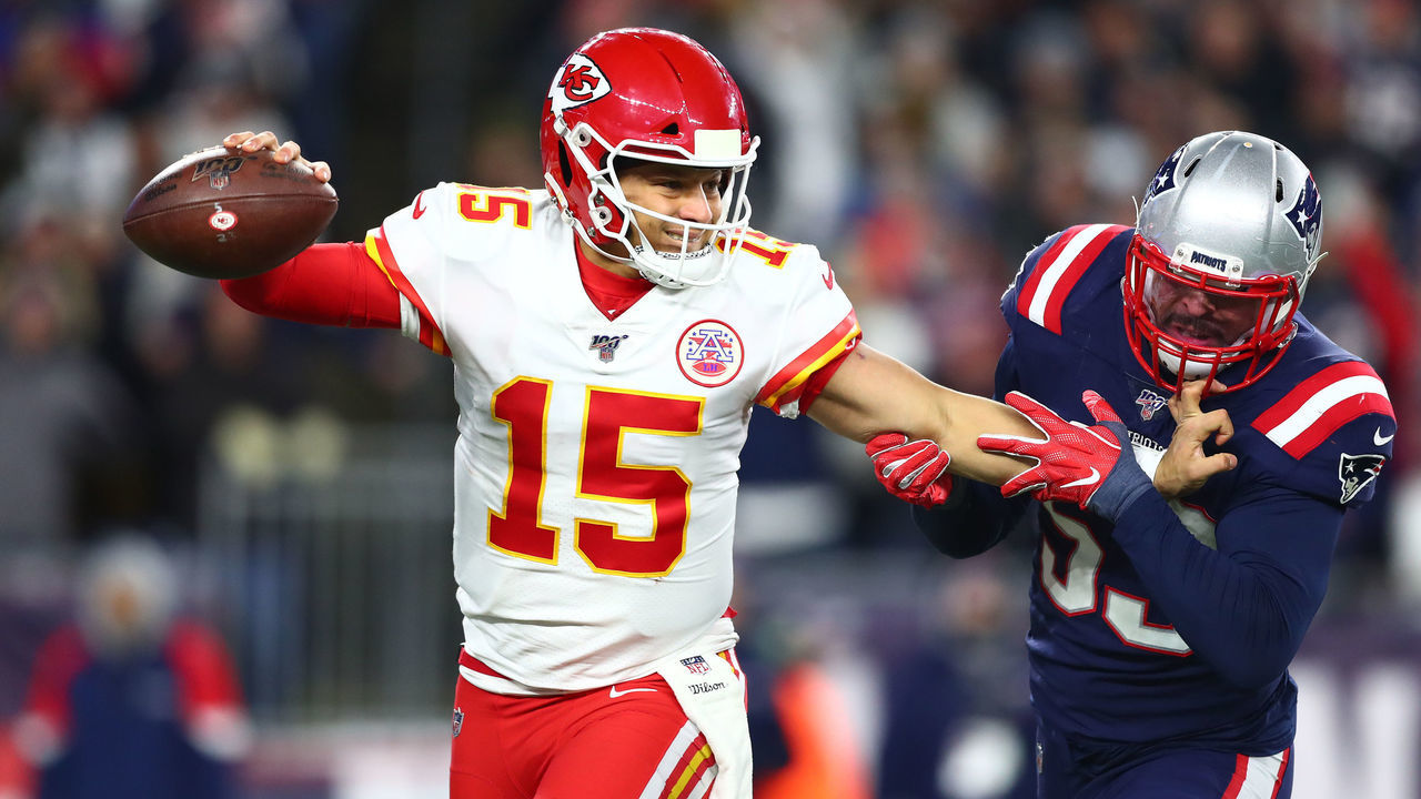 FOXBOROUGH, MASSACHUSETTS - DECEMBER 08: Kyle Van Noy #53 of the New England Patriots attempts to tackle Patrick Mahomes #15 of the Kansas City Chiefs during the second half in the game at Gillette Stadium on December 08, 2019 in Foxborough, Massachusetts.