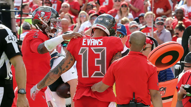 TAMPA, FL - DEC 08: Jameis Winston (3) of the Bucs pats his wide receiver Mike Evans (13) on the shoulder as Evans leaves the field after injuring his hamstring on the touchdown catch during the regular season game between the Indianapolis Colts and the Tampa Bay Buccaneers on December 08, 2019 at Raymond James Stadium in Tampa, Florida.