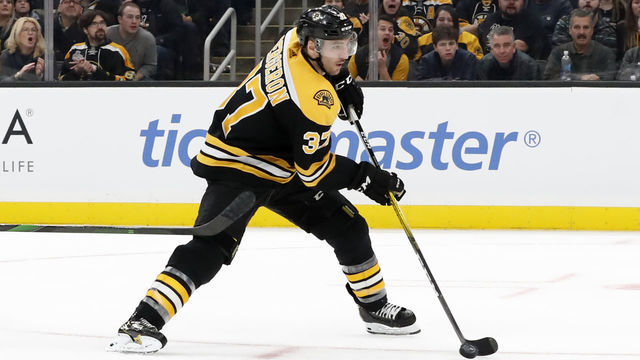 BOSTON, MA - NOVEMBER 21: Boston Bruins center Patrice Bergeron (37) breaks in alone during a game between the Boston Bruins and the Buffalo Sabres on November 21, 2019, at TD Garden in Boston, Massachusetts.