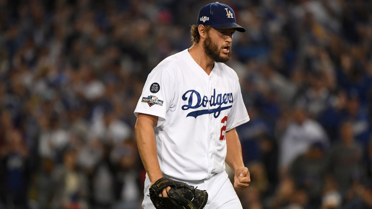 LOS ANGELES, CALIFORNIA - OCTOBER 09: Clayton Kershaw #22 of the Los Angeles Dodgers reacts to the third out of the seventh inning of game five of the National League Division Series against the Washington Nationals at Dodger Stadium on October 09, 2019 in Los Angeles, California.