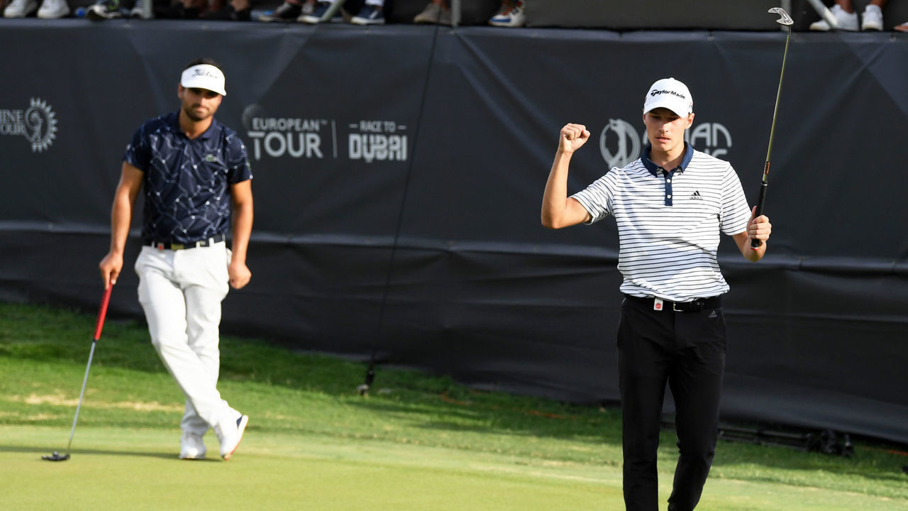 BEL OMBRE, MAURITIUS - DECEMBER 08: Rasmus Hojgaard of Denmark celebrates after winning the Afrasia Bank Mauritius Open as Antoine Rozner of France(L) looks on during Day Four of the Afrasia Bank Mauritius Open at Heritage Golf Club on December 08, 2019 in Bel Ombre, Mauritius.