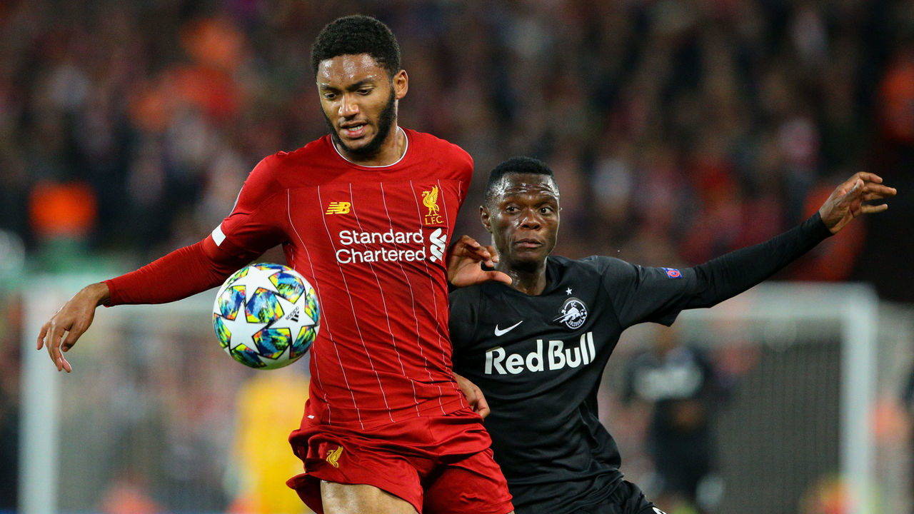 LIVERPOOL, ENGLAND - OCTOBER 02: Liverpool's Joe Gomez vies for possession with Red Bull Salzburg's Patson Daka during the UEFA Champions League group E match between Liverpool FC and RB Salzburg at Anfield on October 2, 2019 in Liverpool, United Kingdom.