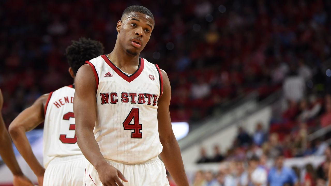 RALEIGH, NC - FEBRUARY 15: North Carolina State Wolfpack guard Dennis Smith Jr. (4) reacts to a turnover during a game between the North Carolina Tarheels and the North Carolina State Wolfpack on February 15, 2017 at PNC Arena in Raleigh, NC. North Carolina defeated NC State 97-73.