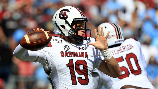 CHARLOTTE, NORTH CAROLINA - AUGUST 31: Jake Bentley #19 of the South Carolina Gamecocks drops back to pass against the North Carolina Tar Heels during the Belk College Kickoff game at Bank of America Stadium on August 31, 2019 in Charlotte, North Carolina.