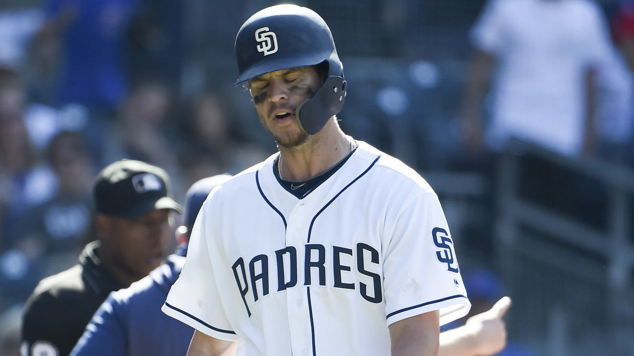 SAN DIEGO, CA - SEPTEMBER 12: Wil Myers #4 of the San Diego Padres walks to the dugout after being ejected from the game during the ninth inning of a baseball game against Chicago Cubs at Petco Park September 12, 2019 in San Diego, California.