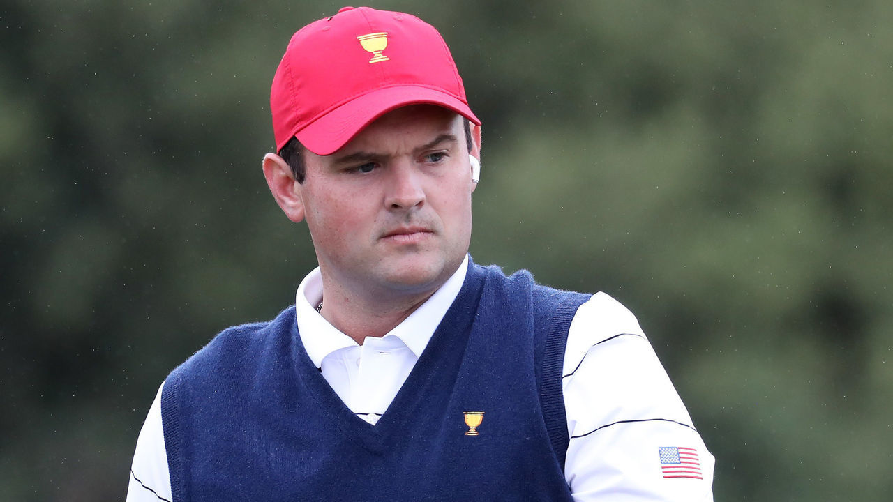 MELBOURNE, AUSTRALIA - DECEMBER 10: Patrick Reed of the United States team looks on as he practices on the range ahead of the 2019 Presidents Cup at the Royal Melbourne Golf Course on December 10, 2019 in Melbourne, Australia.