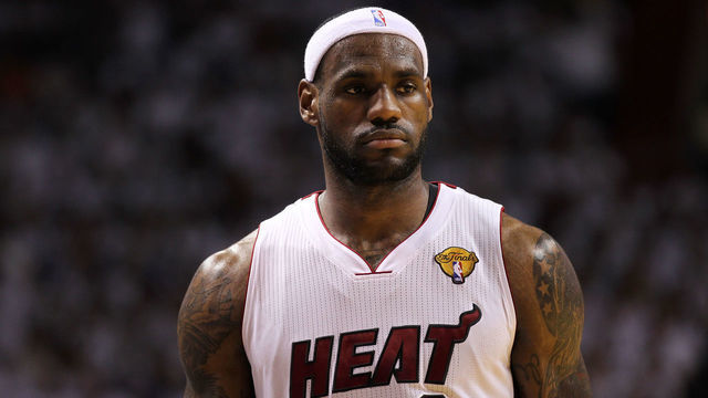 MIAMI, FL - JUNE 12: LeBron James #6 of the Miami Heat looks on against the Dallas Mavericks in Game Six of the 2011 NBA Finals at American Airlines Arena on June 12, 2011 in Miami, Florida. NOTE TO USER: User expressly acknowledges and agrees that, by downloading and/or using this Photograph, user is consenting to the terms and conditions of the Getty Images License Agreement.