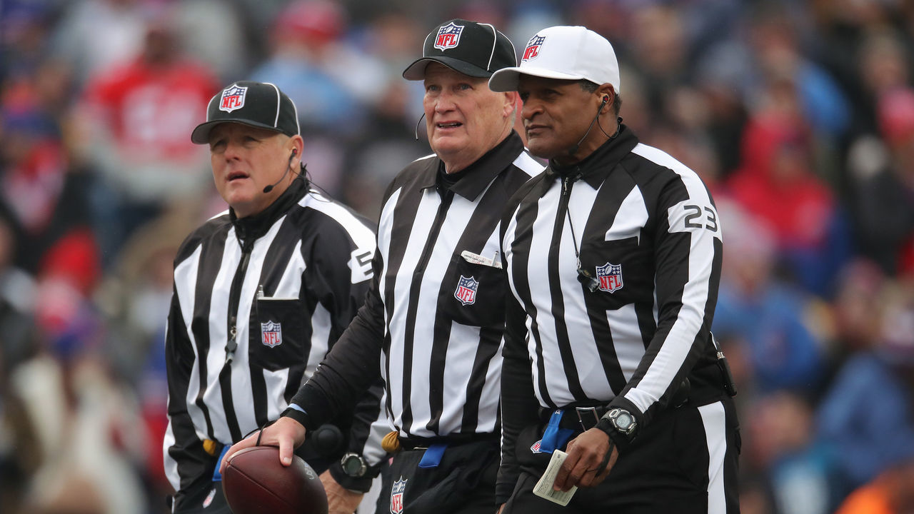 BUFFALO, NY - DECEMBER 16: Line judge Rusty Baynes #17 and umpire Bill Schuster #129 and referee Jerome Boger #23 during the Buffalo Bills NFL game against the Detroit Lions at New Era Field on December 16, 2018 in Buffalo, New York.