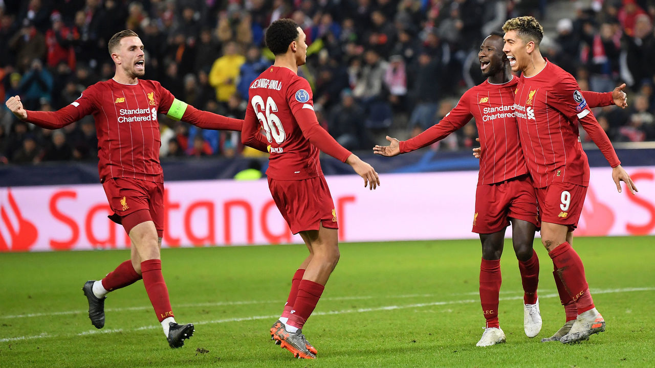 SALZBURG, AUSTRIA - DECEMBER 10: Naby Keita of Liverpool celebrates with Roberto Firmino after he scores his team's first goal during the UEFA Champions League group E match between RB Salzburg and Liverpool FC at Red Bull Arena on December 10, 2019 in Salzburg, Austria.