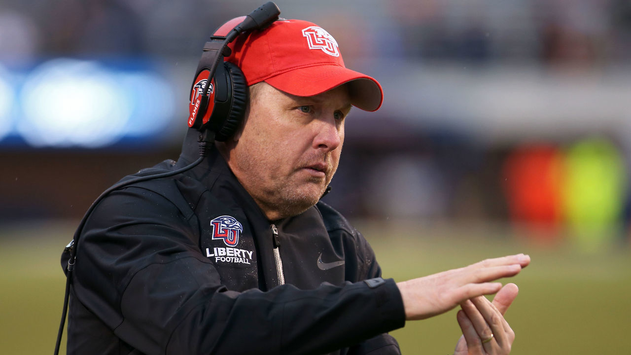 CHARLOTTESVILLE, VA - NOVEMBER 23: Head coach Hugh Freeze of the Liberty Flames calls a timeout in the second half during a game against the Virginia Cavaliers at Scott Stadium on November 23, 2019 in Charlottesville, Virginia.