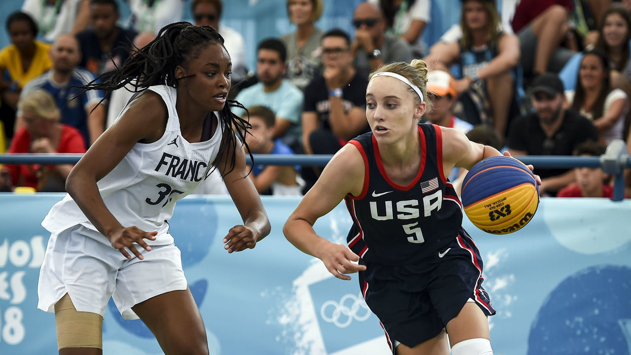 BUENOS AIRES, ARGENTINA - OCTOBER 17: Paige Bueckers of United States controls the ball against Olivia Yale of France in the Women's Gold Medal Game during day 11 of the Youth Olympic Games at Urban Park Puerto Madero on October 17, 2018 in Buenos Aires, Argentina.
