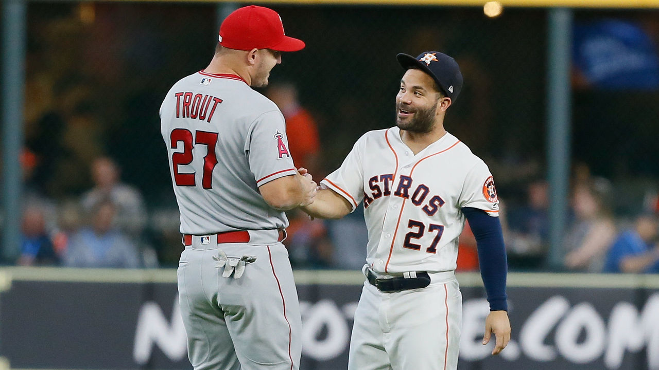 HOUSTON, TX - AUGUST 30: Mike Trout #27 of the Los Angeles Angels of Anaheim talks with Jose Altuve #27 of the Houston Astros before a baseball game at Minute Maid Park on August 30, 2018 in Houston, Texas.