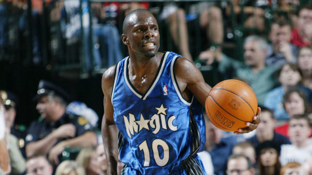 DALLAS - APRIL 5: Darrell Armstrong #10 of the Orlando Magic dribbles against the Dallas Mavericks during the game at American Airlines Center on April 5, 2003 in Dallas, Texas. The Mavericks won 108-90. NOTE TO USER: User expressly acknowledges and agrees that, by downloading and/or using this Photograph, User is consenting to the terms and conditions of the Getty Images License Agreement Mandatory Copyright Notice: Copyright 2003 NBAE